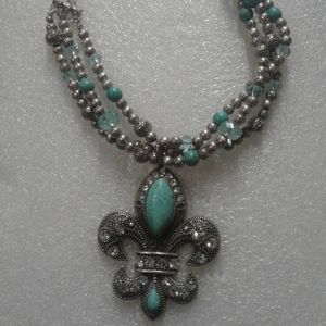 Gorgeous turquoise and silver beaded necklace!